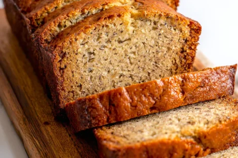 Sliced banana bread on a cutting board